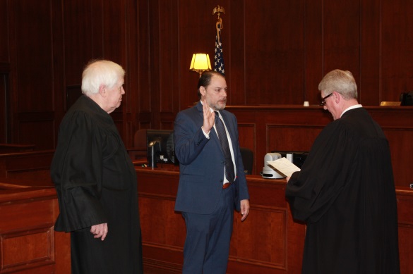 Magistrate Judge Jon A. York takes
oath of office
